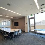 Bayview room with tables located on the 5th floor of Eshleman Hall