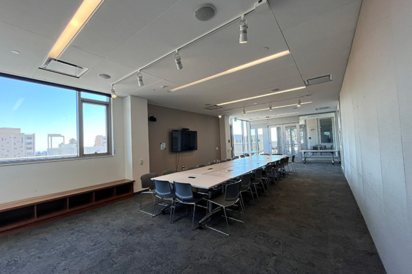 Bayview room with tables located on the 5th floor of Eshleman Hall