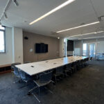 Bayview room with tables located on the 5th floor of Eshleman Hall